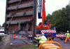 Refurbished lock mitre gates being lifted back at Fiddlers Ferry, Penketh, Warrington, Cheshire WA5 2UJ in 2011