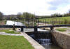 Timber Lock Gates in Bude Cornwall looking up stream 