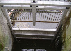 Drop down Weir controlling the level of of marsh land for the RSPB, Rye Meads, Hertfordshire